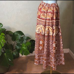 Long flowy skirt, elephant designs, earth tone colors, jingle bell tie waist, XS